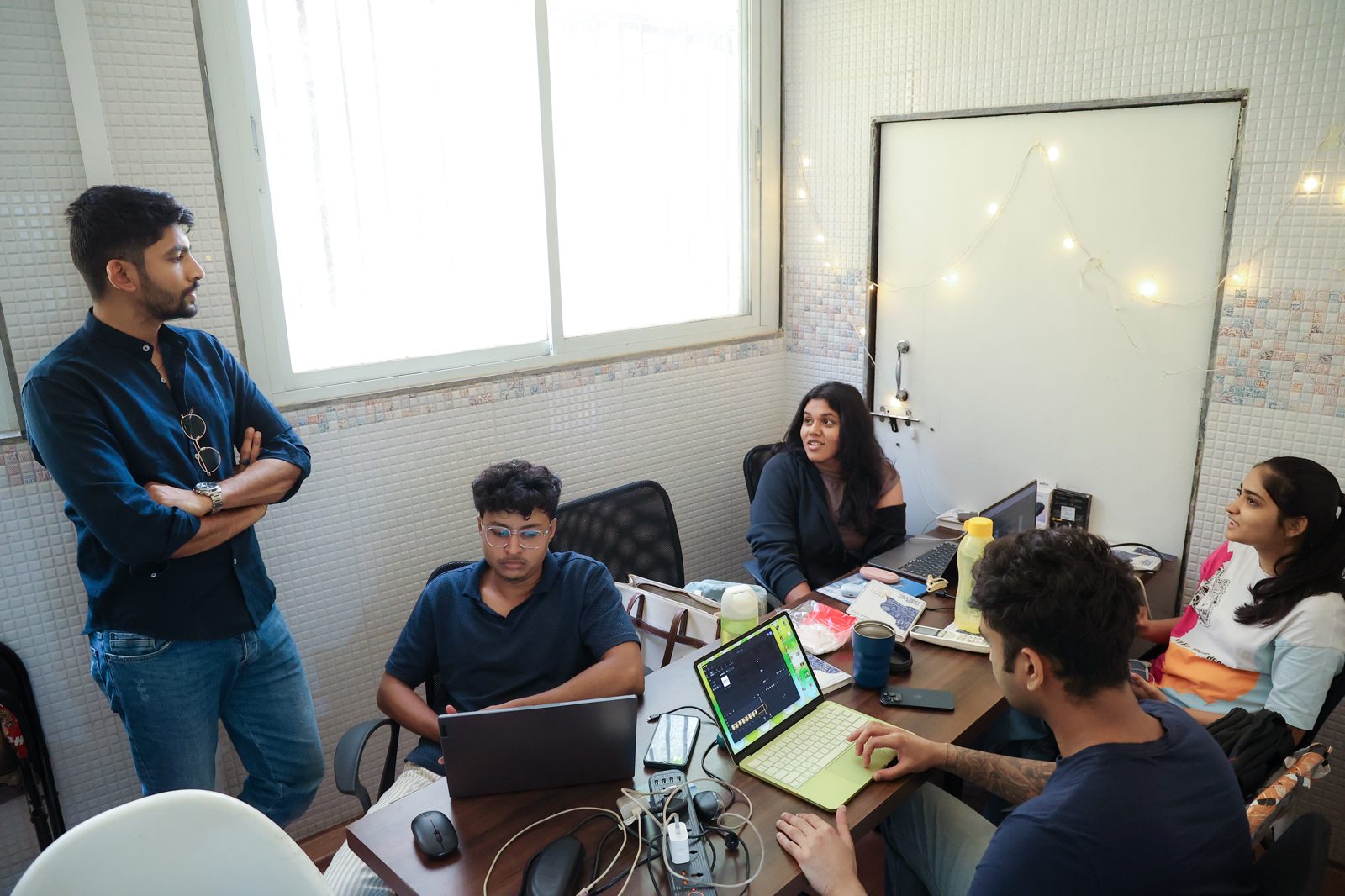 Manan leading a working session with the team