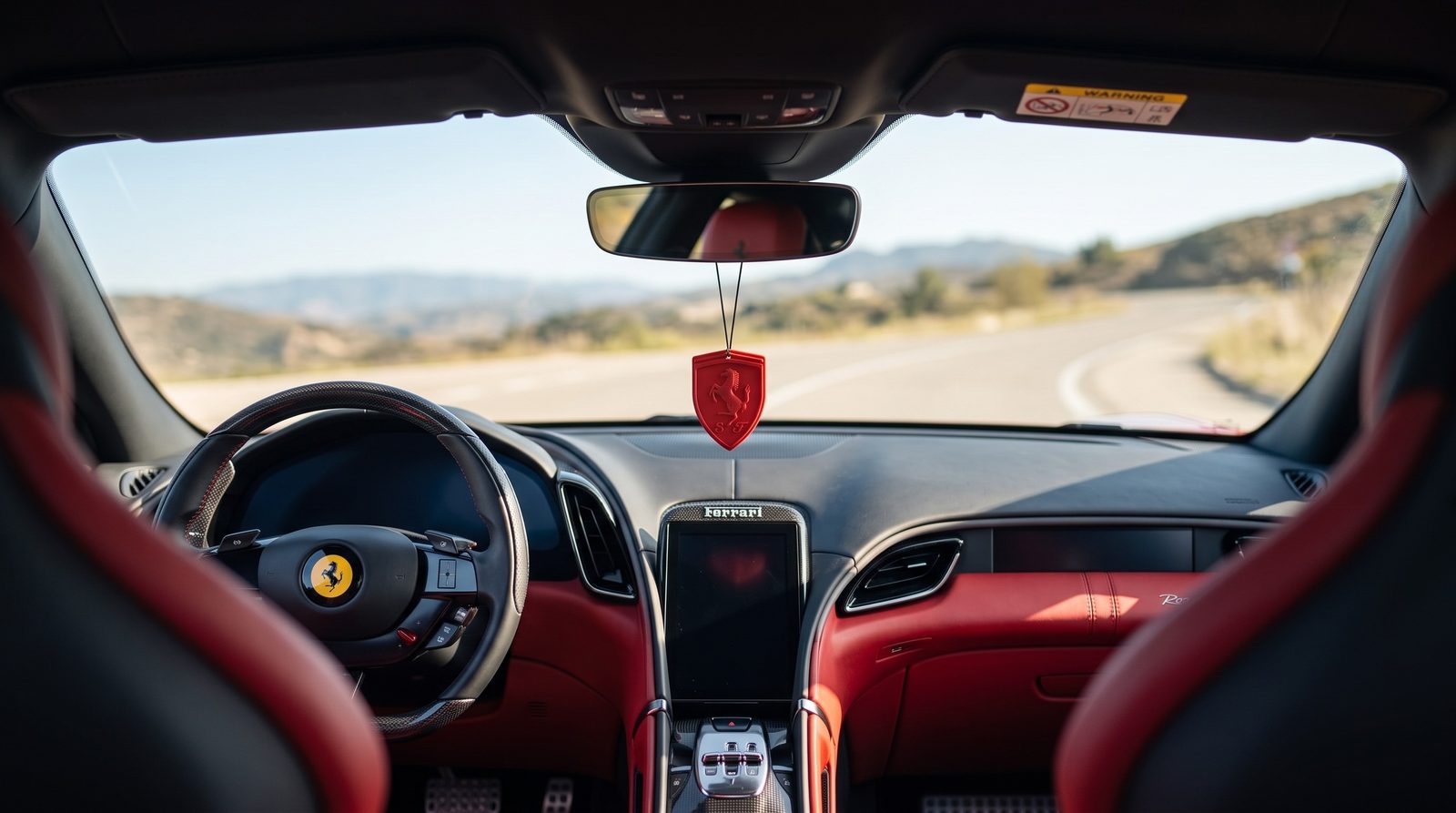 Branded card on a rear view mirror